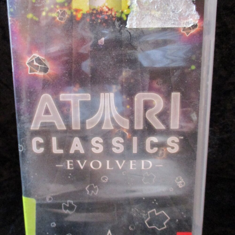Pre-Owned 2007 Atari Classics Evolved PSP Game w/Manuel